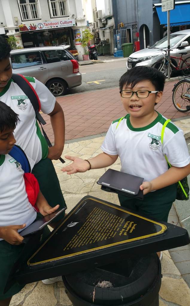 The students had to complete a digital trail of the journey on iPad. They discovered statues at Telok Ayer Green depicting early Singapore.